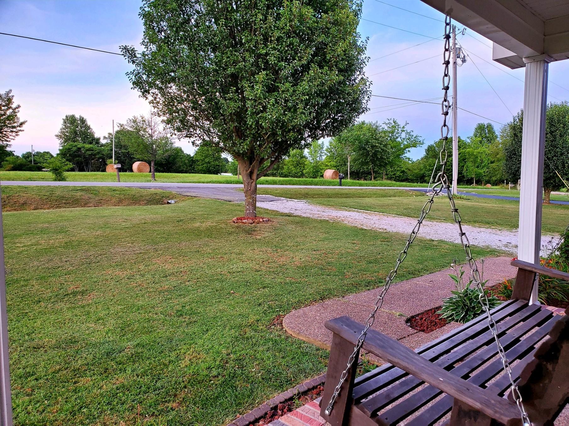 389 Corinth Road Portland, TN 37148 - Photo 2 of 6 a view of a backyard with a garden