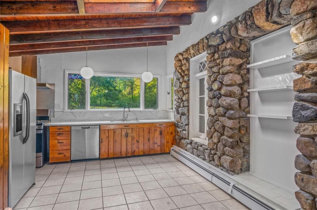 11 Hardscrabble Road North Salem, NY 10560 - Photo 1 of 1 a kitchen with stainless steel appliances granite countertop a refrigerator and a stove