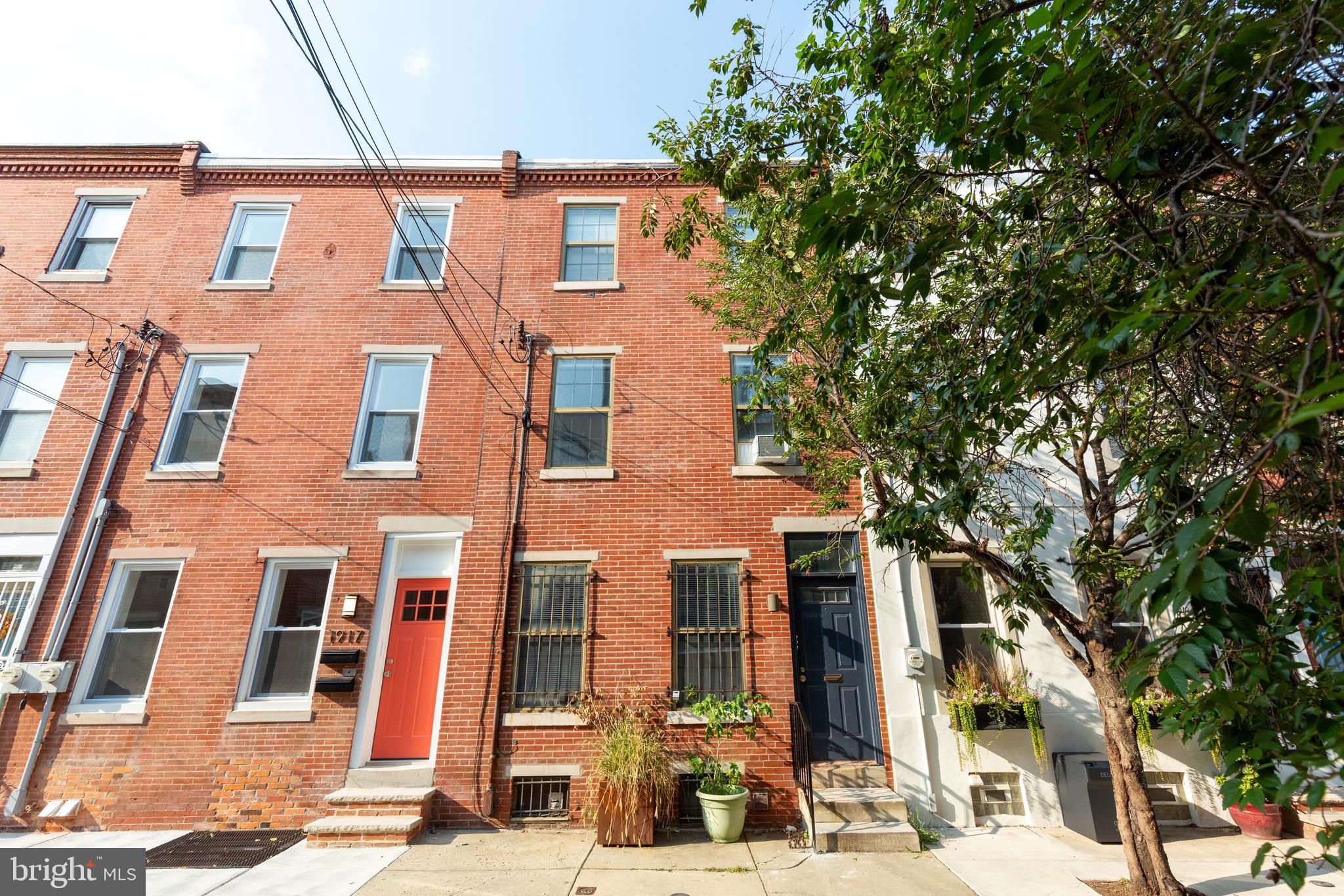a view of a building with a street