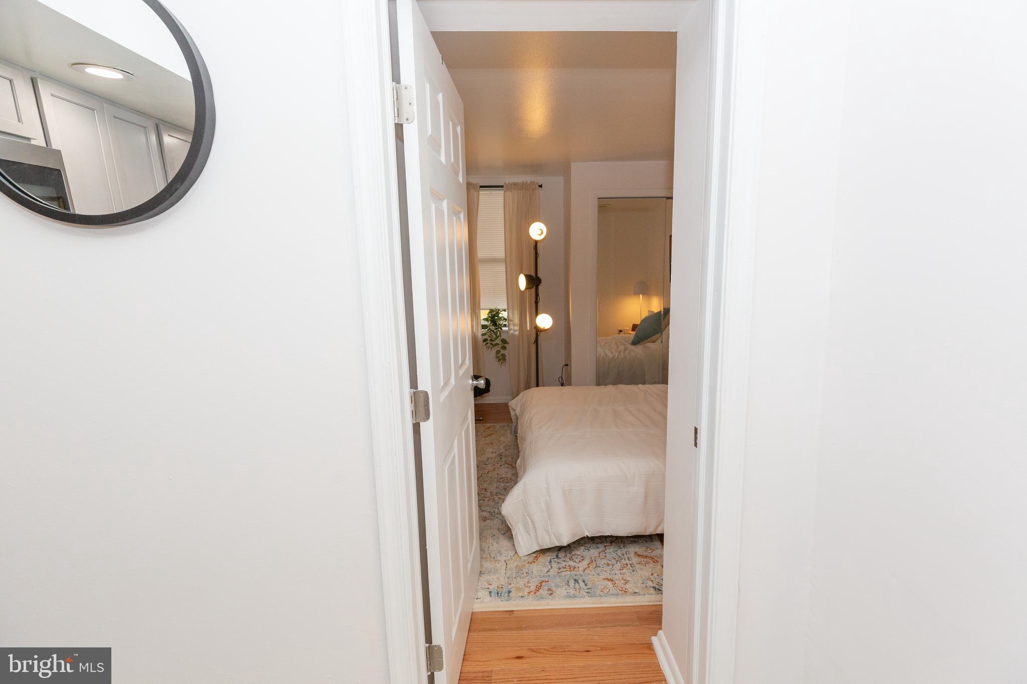 1915 Pemberton Street, Unit 2 Philadelphia, PA 19146 - Photo 12 of 16 a view of a mirror and a bathroom with a mirror