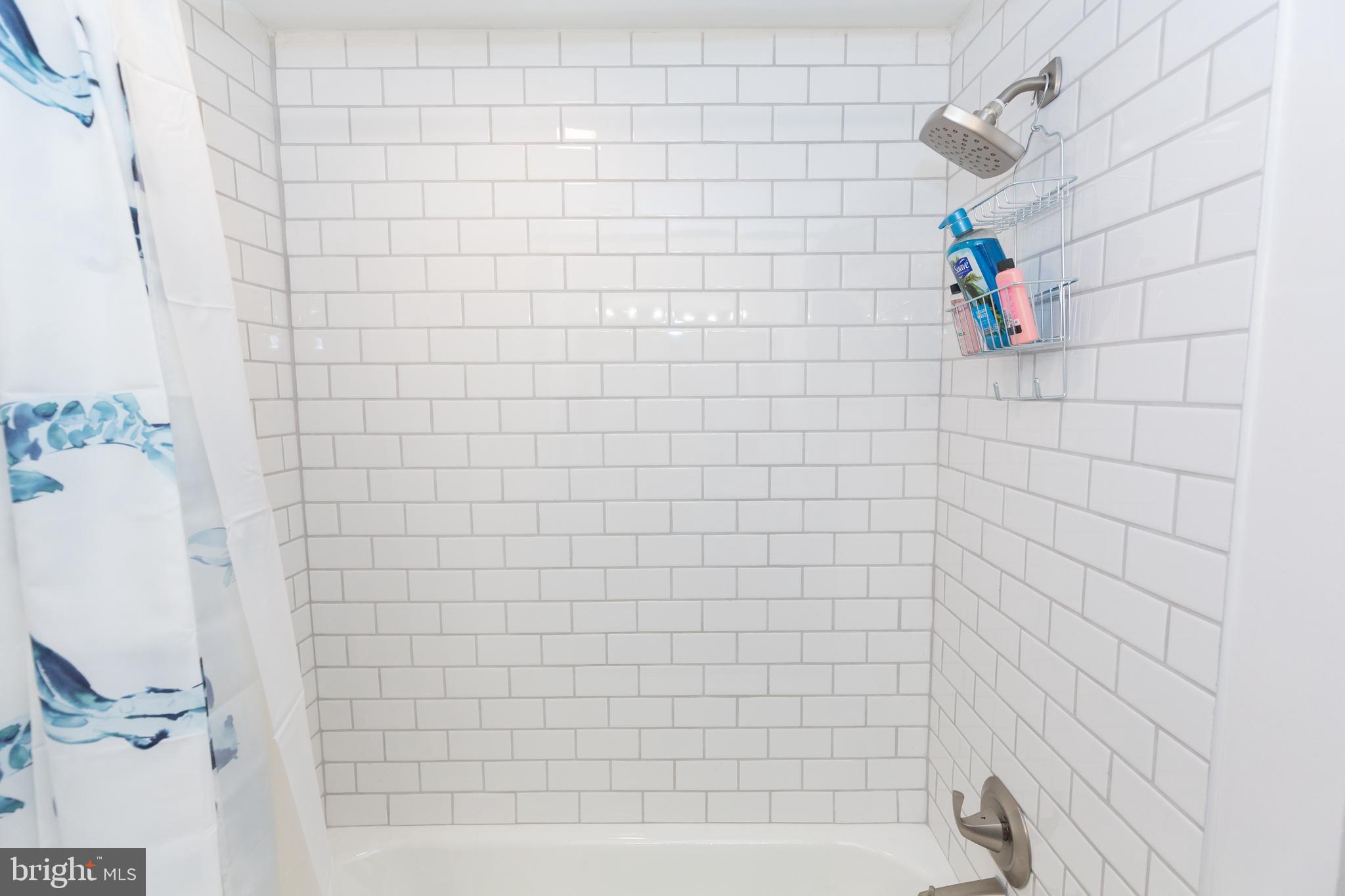 1915 Pemberton Street, Unit 2 Philadelphia, PA 19146 - Photo 10 of 16 a bathroom with a shower
