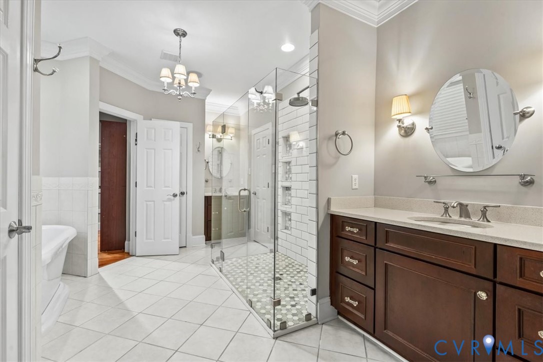 3308 Yarding Way Toano, VA 23168 - Photo 46 of 83 a spacious bathroom with a double vanity sink mirror and shower