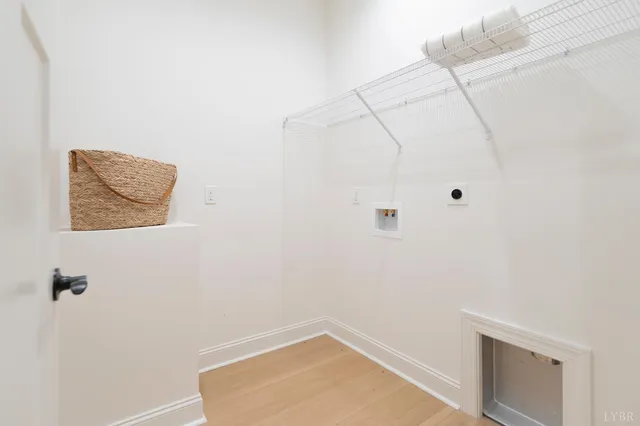 a kitchen with stainless steel appliances a stove refrigerator sink and microwave