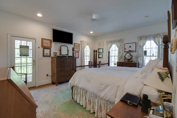 a bathroom with a sink and a large mirror
