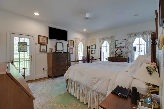 a bathroom with a sink and a large mirror