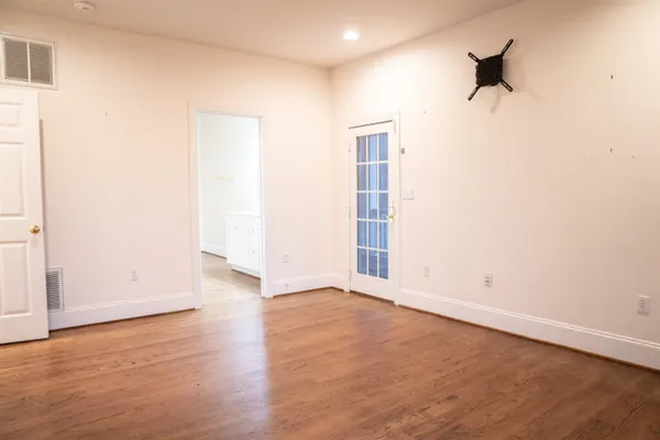 a bed room with furniture and a window