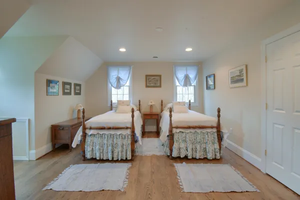 a bathroom with a shower and a sink