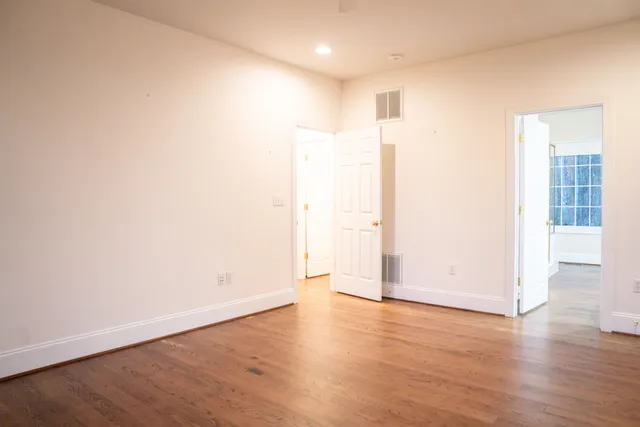 a bathroom with a sink toilet and vanity