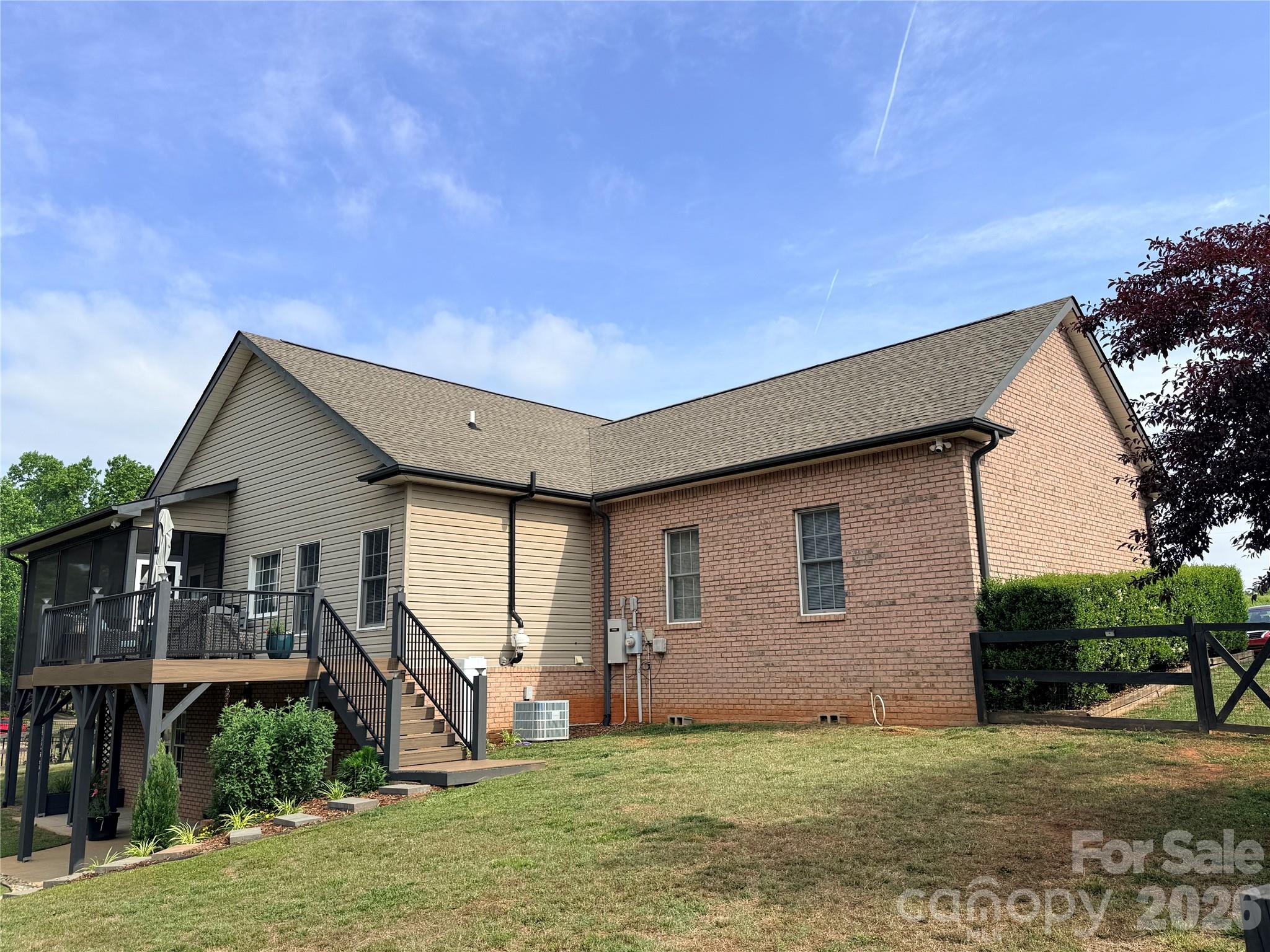 183 Burl Bridges Road Forest City, NC 28043 - Photo 4 of 33 a house view with a garden space
