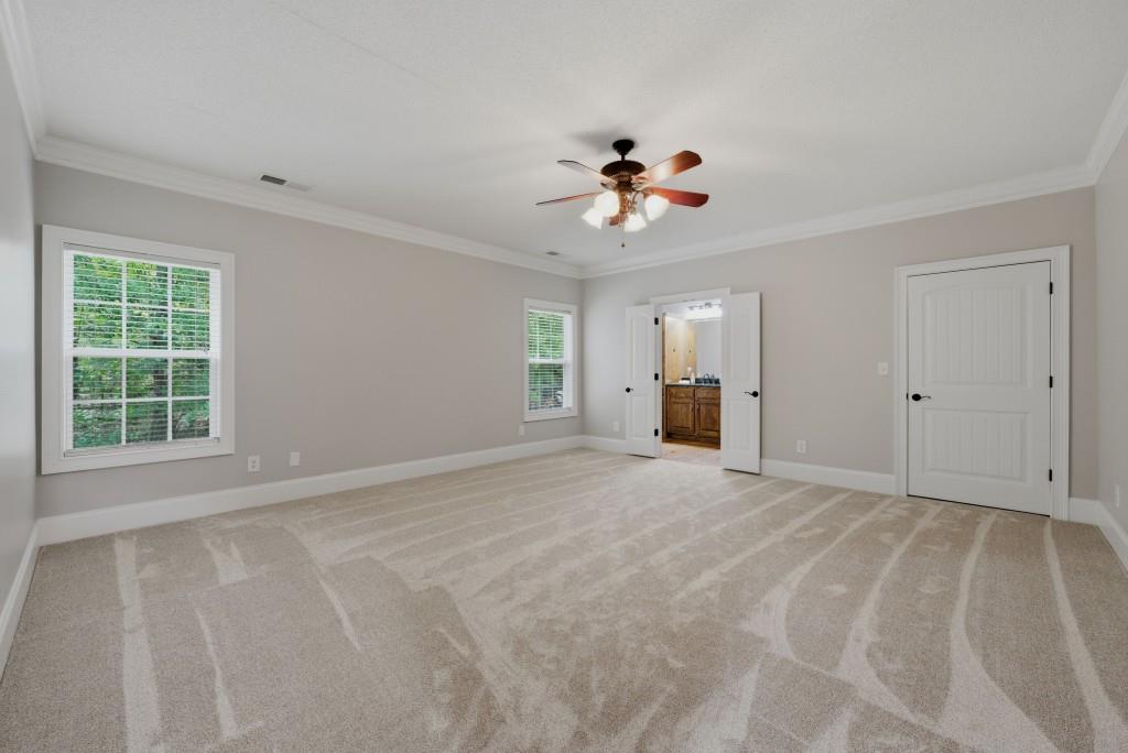 582 Knox Chapel Road Social Circle, GA 30025 - Photo 22 of 49 a view of an empty room with a window