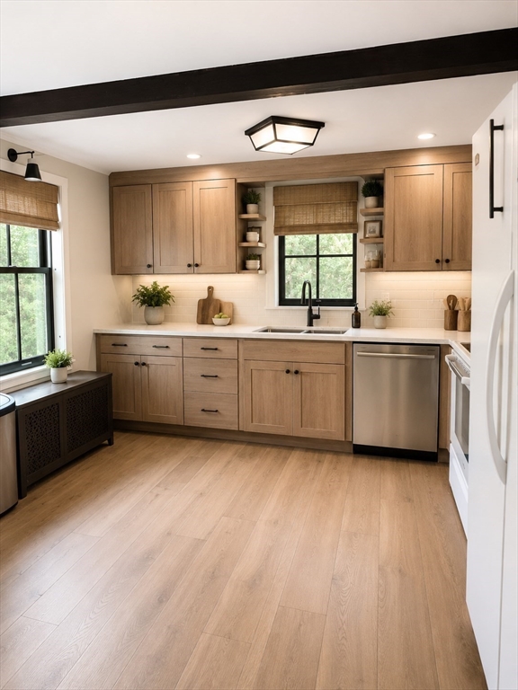 87 Ashfield Road Conway, MA 01341 - Photo 12 of 38 a large kitchen with granite countertop a large window a sink and stainless steel appliances