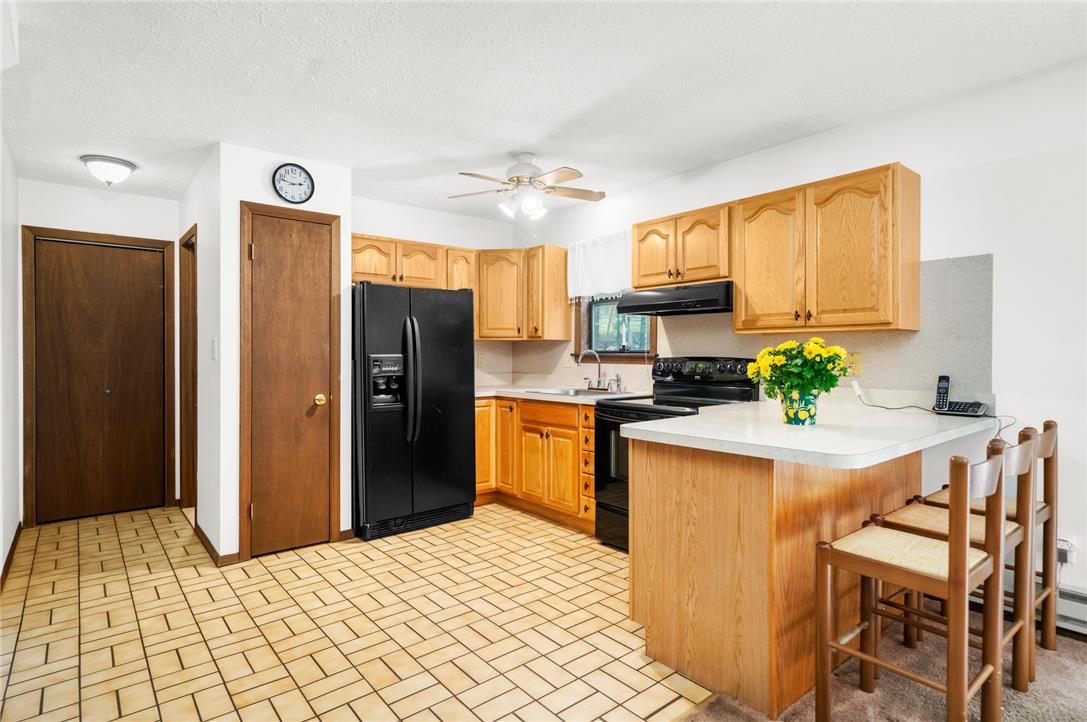 222 Powder Horn Road Henryville, PA 18332 - Photo 8 of 25 A classic kitchen with ample counter space and warm-toned cabinetry awaits your culinary touch.
