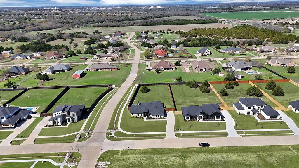 443 Whispering Way Red Oak, TX 75154 - Photo 35 of 36 an aerial view of a tennis ground and a large park