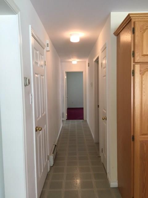 841 Bunker Hill Road Jefferson, ME 04348 - Photo 35 of 35 Hallway from the kitchen towards the...