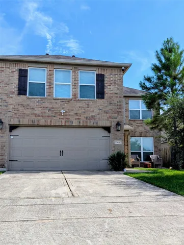 a house view with a backyard