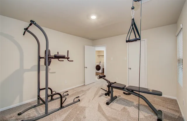 a view of a house with a yard and porch