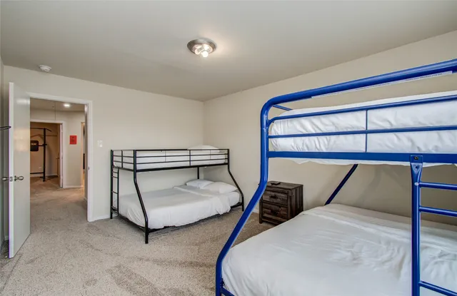 a view of a swimming pool with a garden and plants