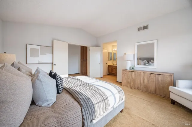 a bedroom with a bed and furniture