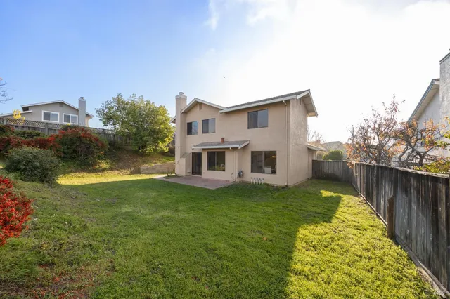 a house view with a garden space