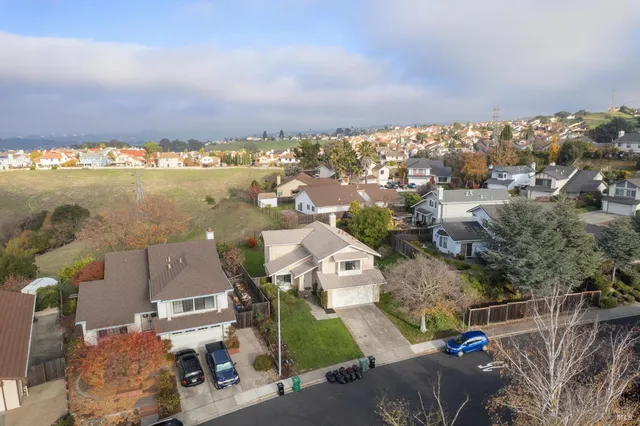 an aerial view of a city with lots of residential buildings