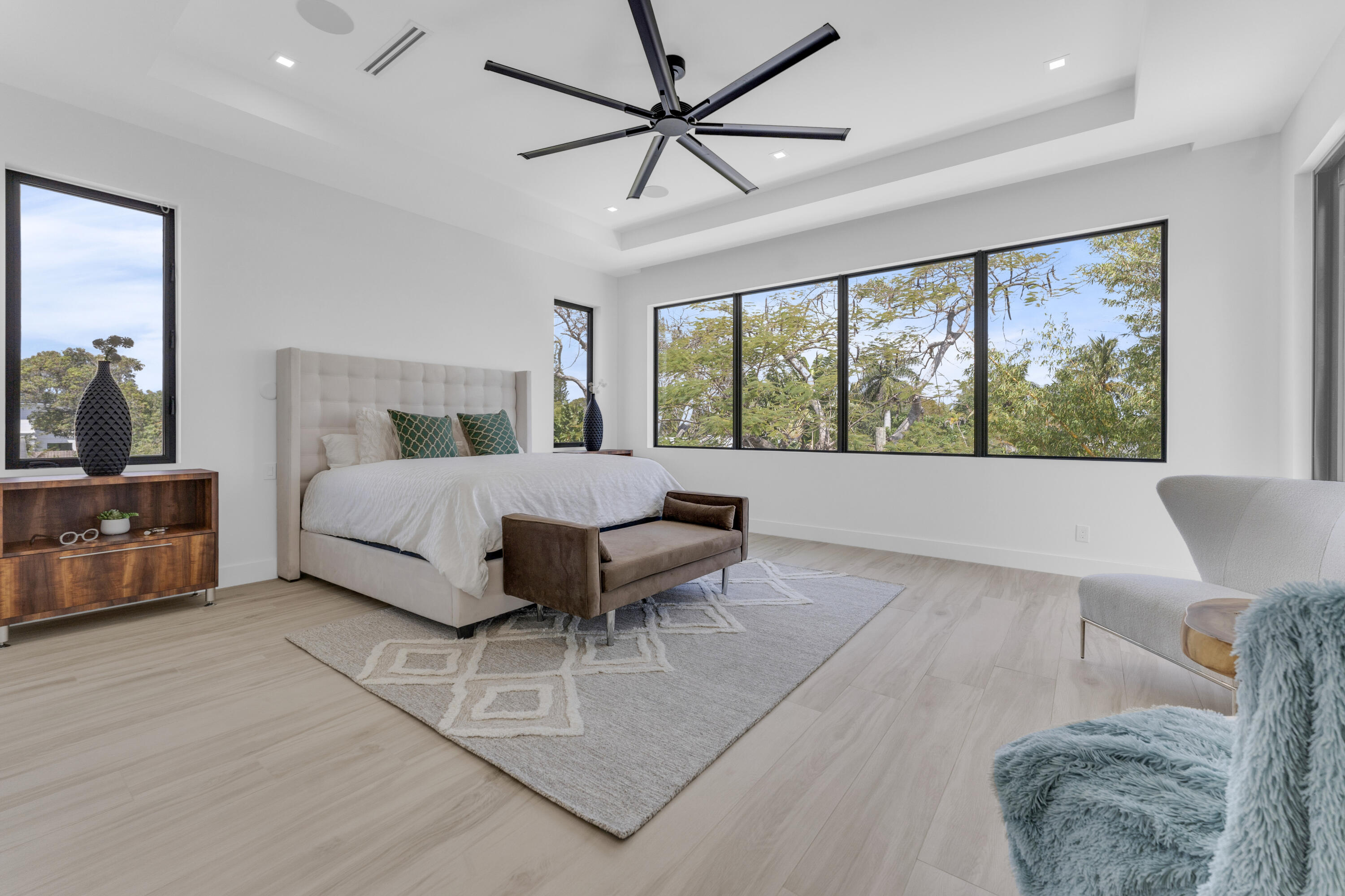 239 Northeast 11th Street Delray Beach, FL 33444 - Photo 23 of 59 a living room with furniture a large window and a rug