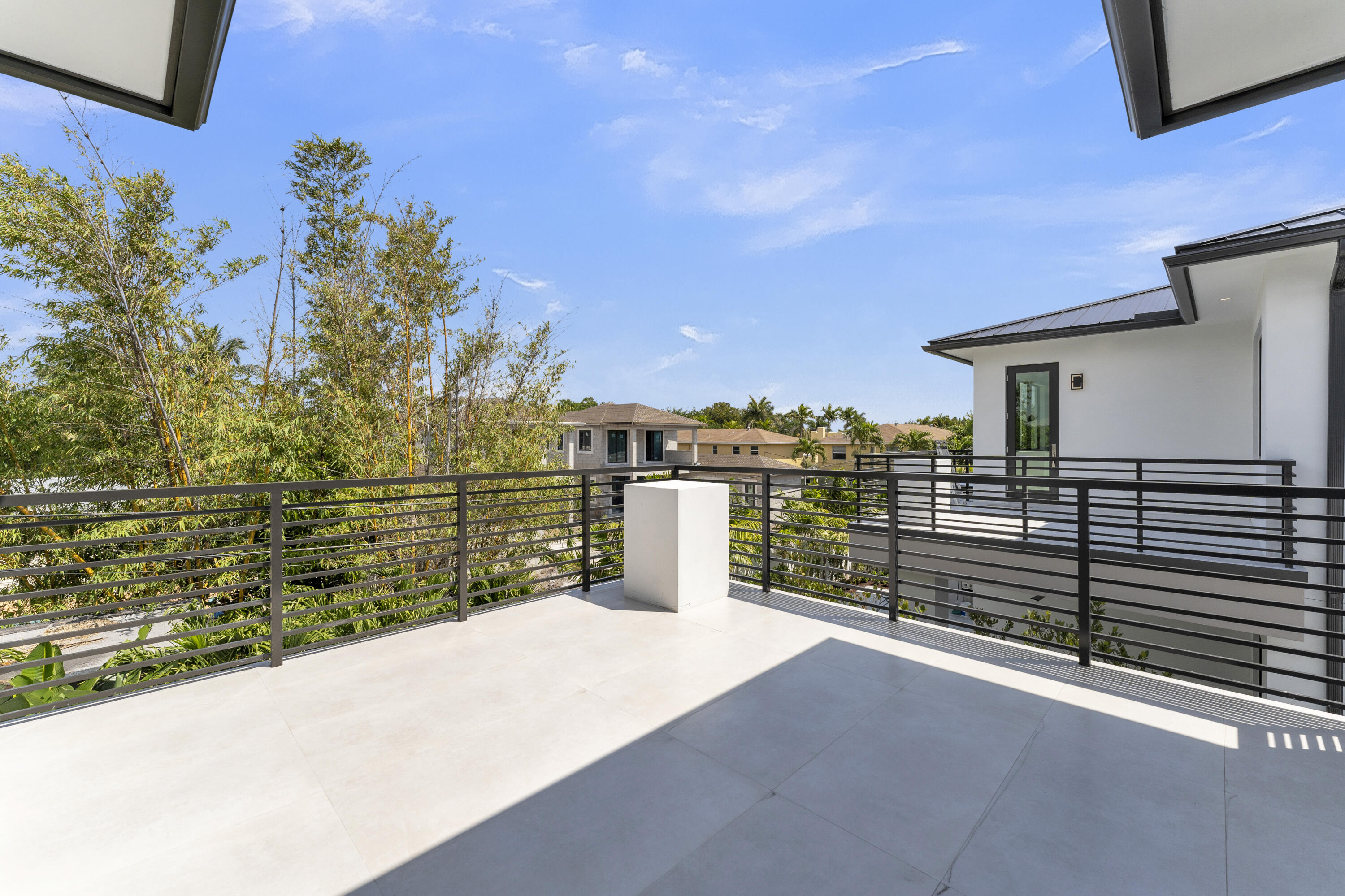 239 Northeast 11th Street Delray Beach, FL 33444 - Photo 49 of 59 a view of a terrace with skyline