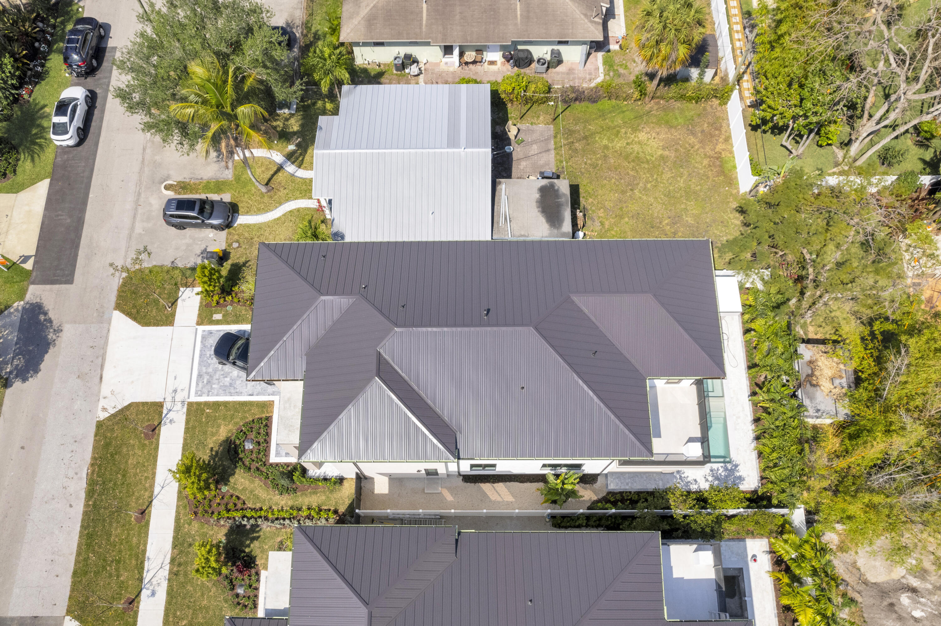 239 Northeast 11th Street Delray Beach, FL 33444 - Photo 54 of 59 an aerial view of a house with swimming pool