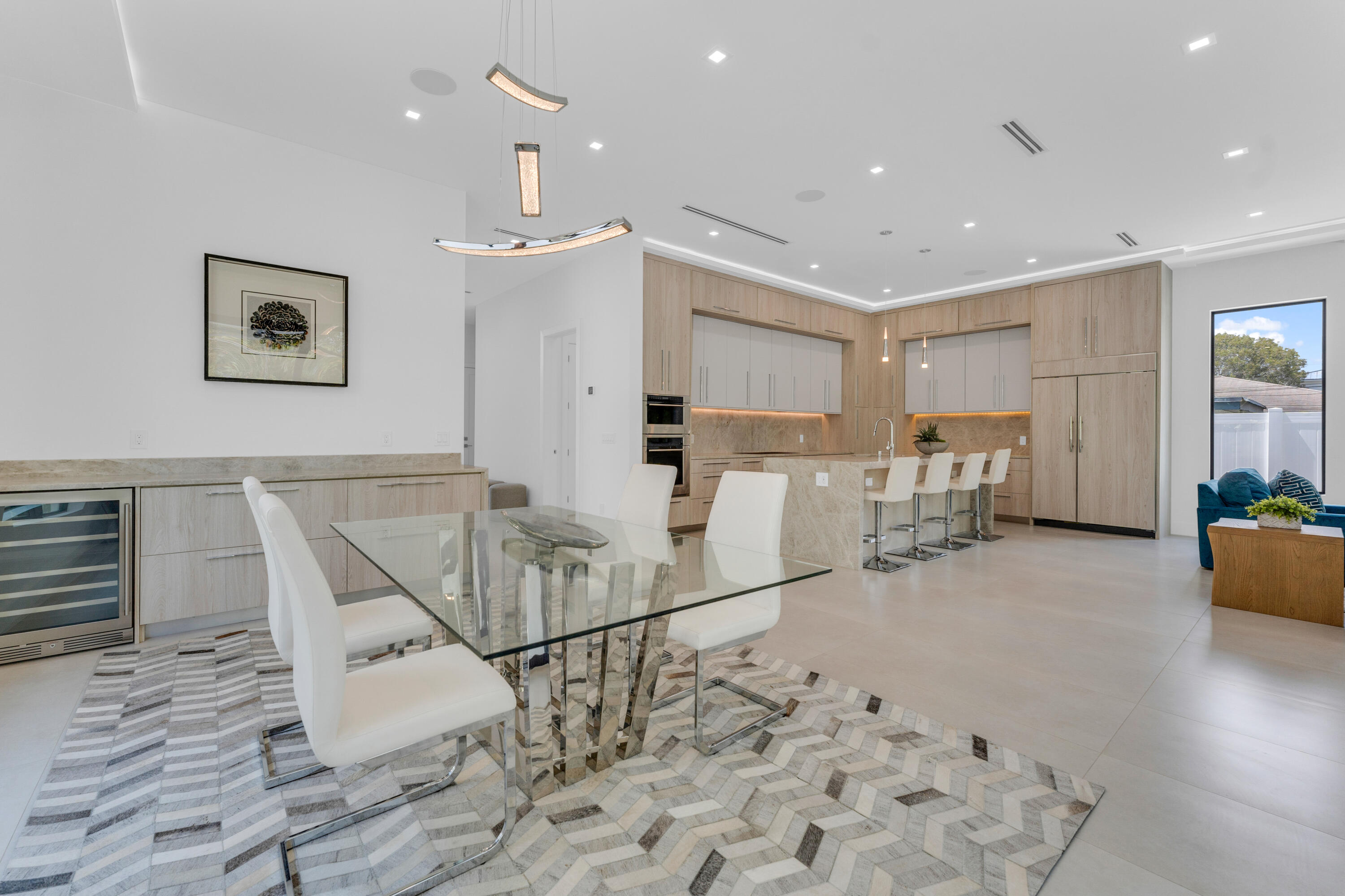 239 Northeast 11th Street Delray Beach, FL 33444 - Photo 6 of 59 a view of kitchen with furniture and refrigerator