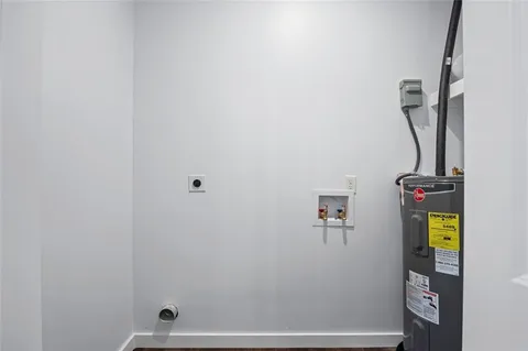 a view of a wooden fence and trees
