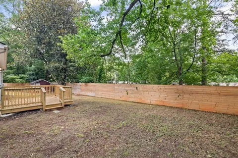 a house view with a garden space