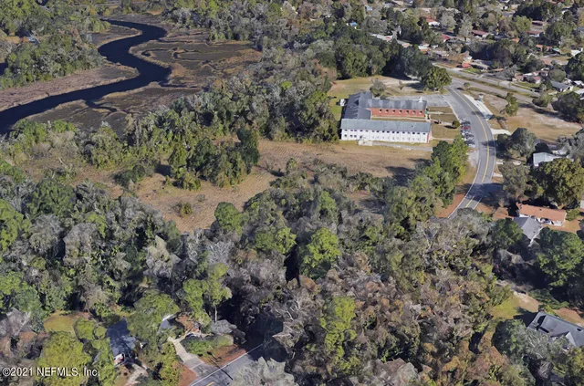 a aerial view of residential houses with outdoor space