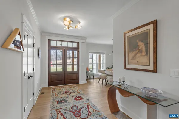 a living room with furniture and a table