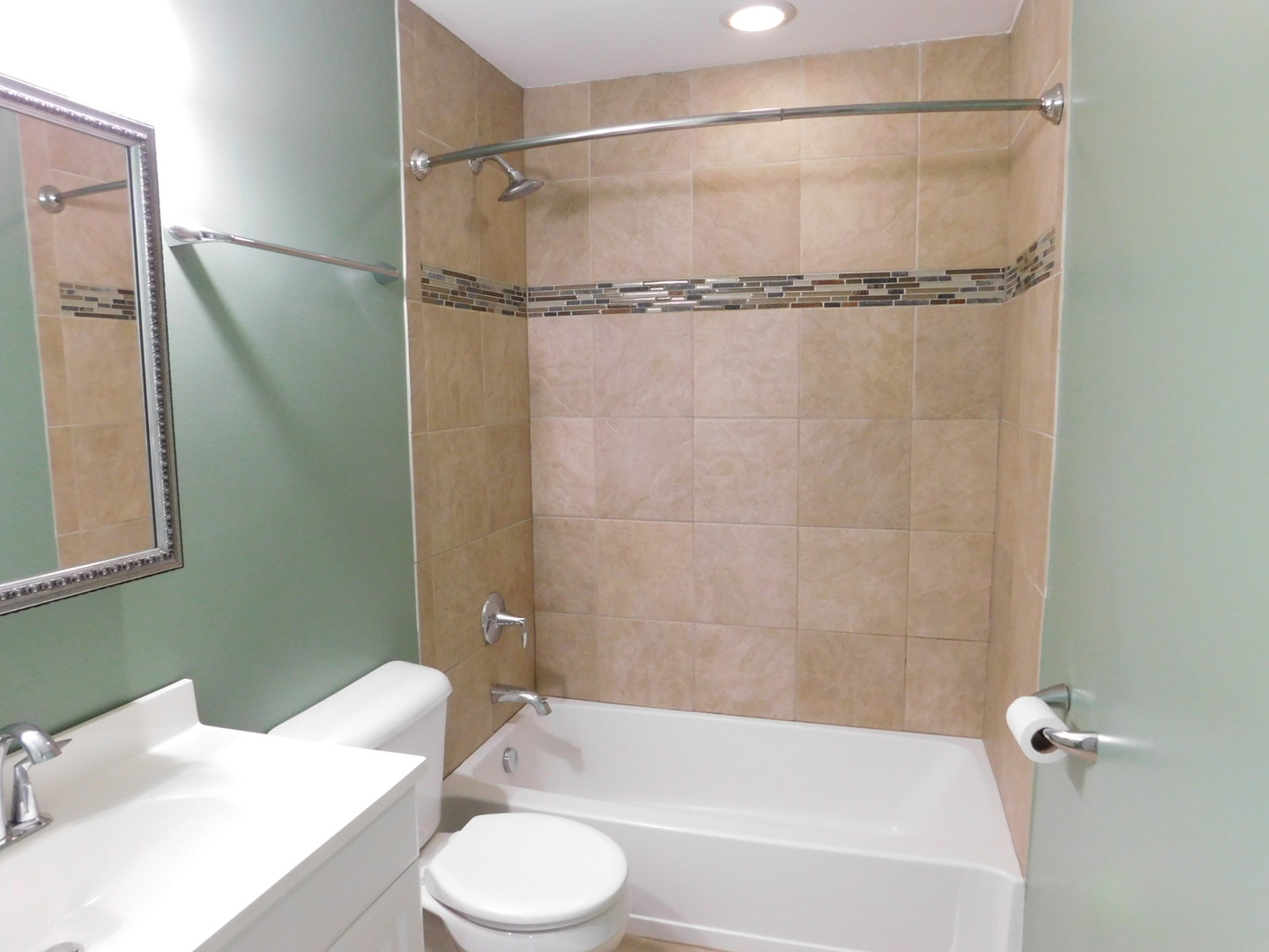 19398 Wolf Road, Unit 8 Mokena, IL 60448 - Photo 8 of 9 a bathroom with a sink a toilet and shower