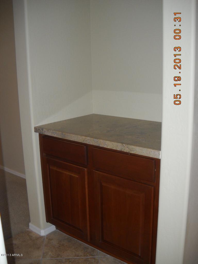 3276 East Hopkins Road Gilbert, AZ 85295 - Photo 7 of 33 Butler's pantry between kitchen/dining