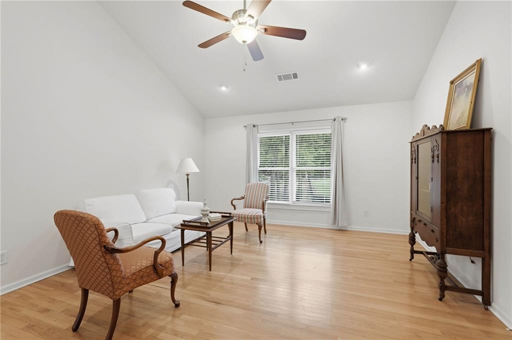 4891 Bill Cheek Road Auburn, GA 30011 - Photo 48 of 99 a dining room with furniture and window