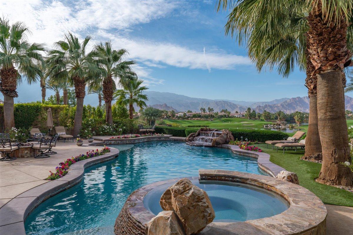 58445 Carmona La Quinta, CA 92253 - Photo 1 of 70 a view of swimming pool and lake view