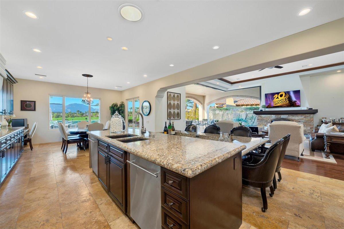 58445 Carmona La Quinta, CA 92253 - Photo 17 of 70 a kitchen with a table and chairs in it