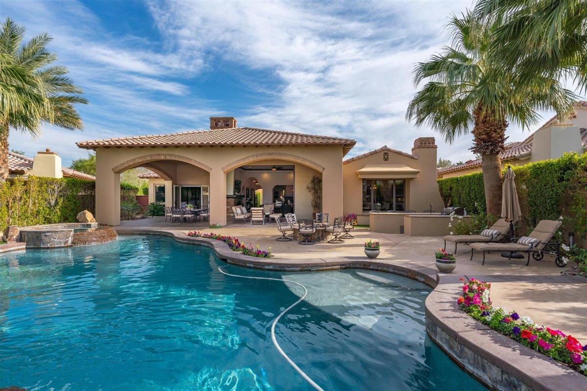 58445 Carmona La Quinta, CA 92253 - Photo 40 of 70 a view of a house with swimming pool and sitting area