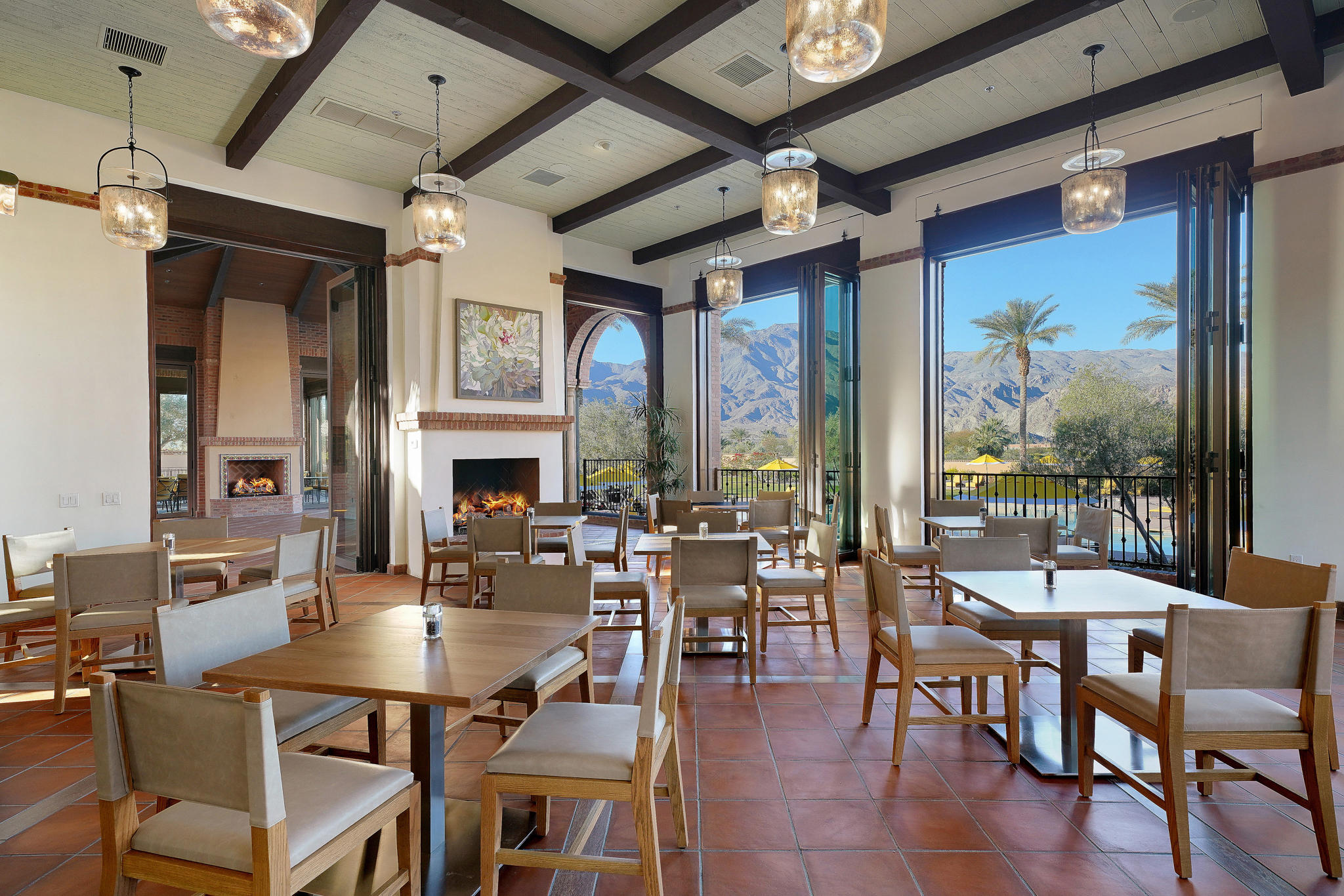 58445 Carmona La Quinta, CA 92253 - Photo 59 of 70 a view of a dining room with furniture window and wooden floor
