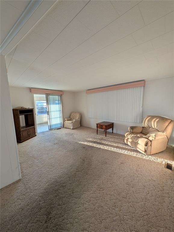 1102 46th Avenue East Ellenton, FL 34222 - Photo 6 of 15 a spacious bedroom with a bed and window