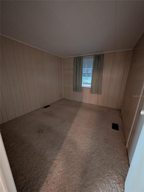 1102 46th Avenue East Ellenton, FL 34222 - Photo 8 of 15 an empty room with windows