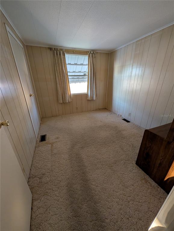 1102 46th Avenue East Ellenton, FL 34222 - Photo 9 of 15 a view of an empty room and window