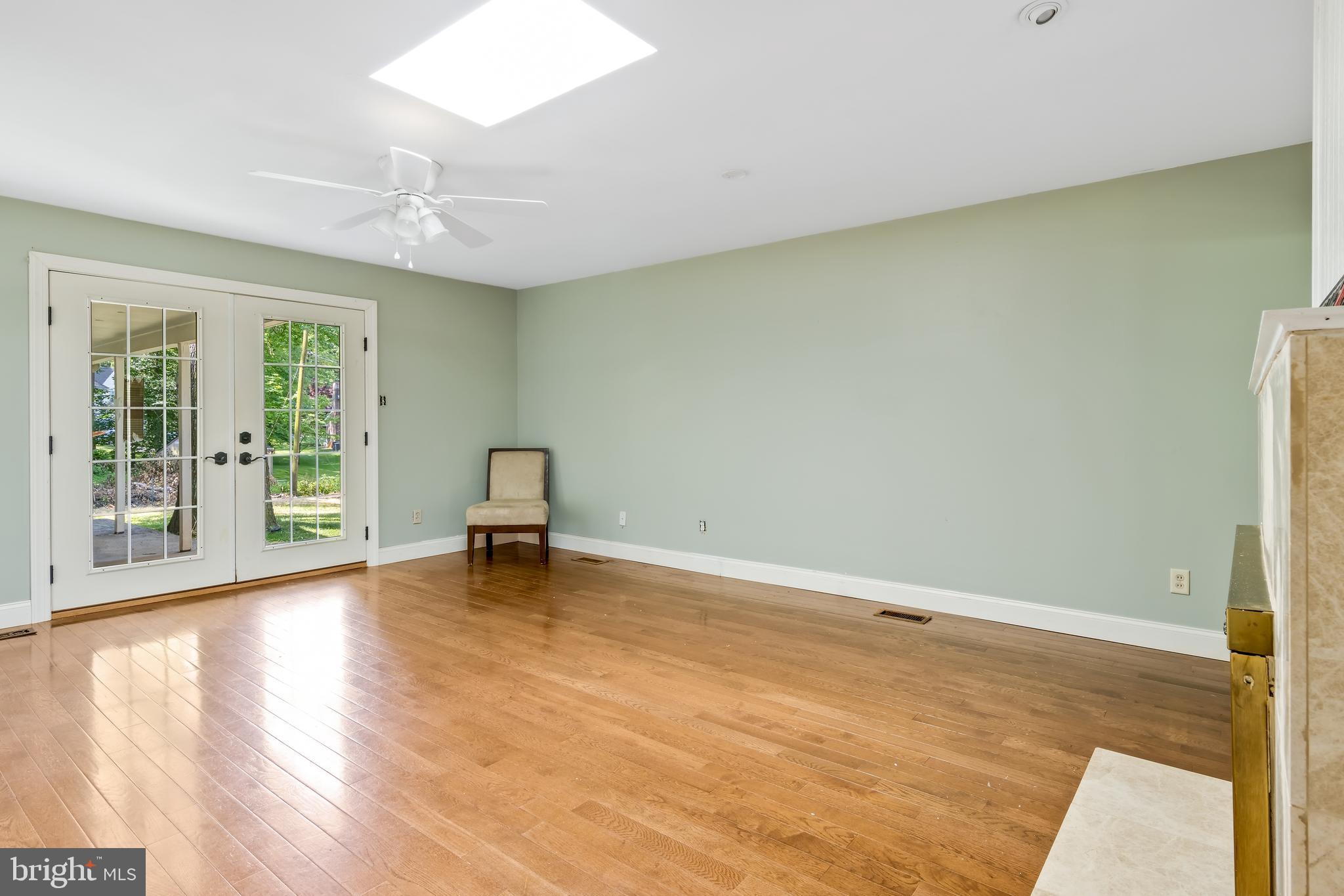 668 Davis Lane Wayne, PA 19087 - Photo 13 of 21 Family Room has doors to rear covered patio