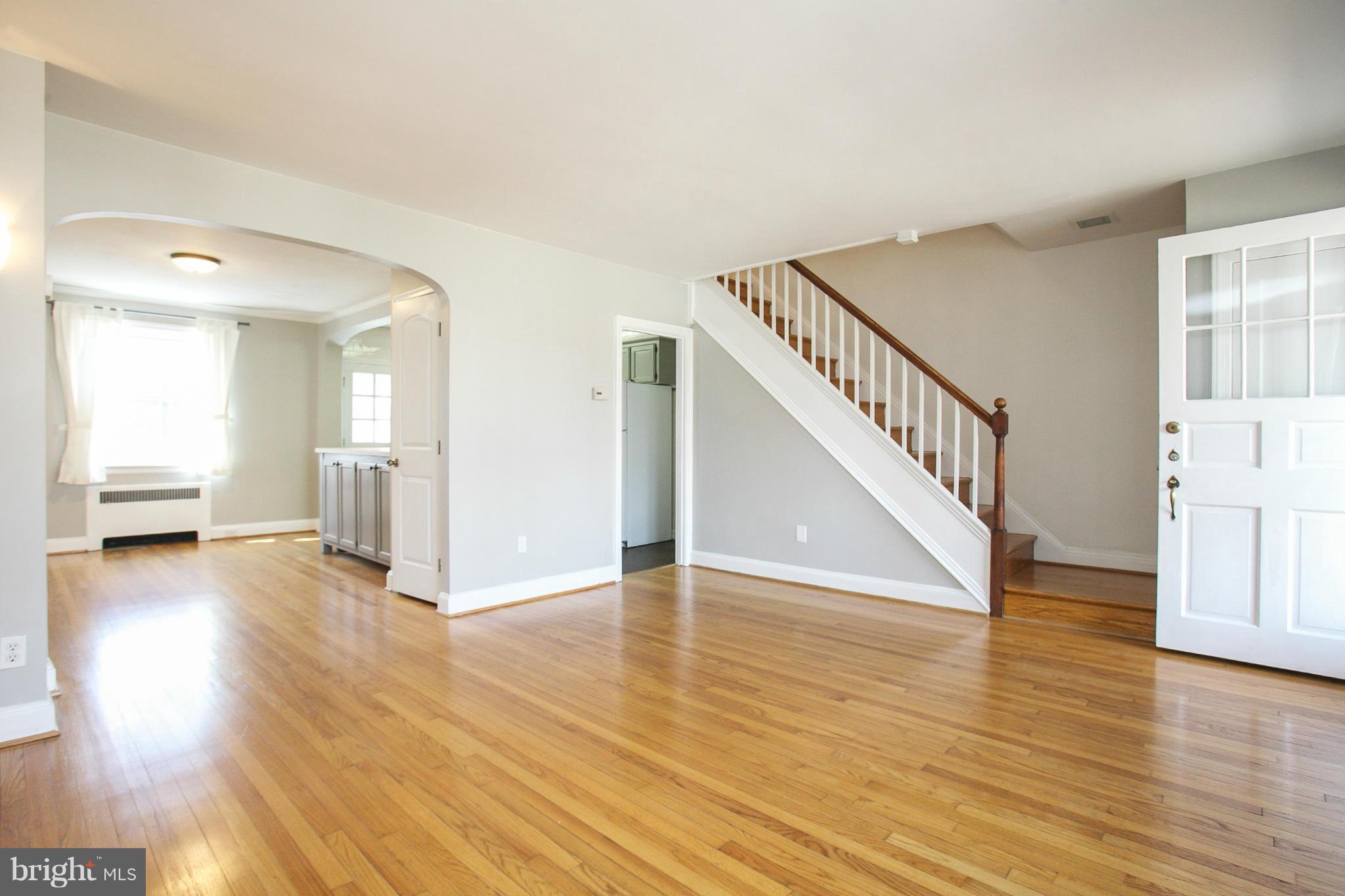 3802 Yolando Road Baltimore, MD 21218 - Photo 4 of 27 a view of a livingroom with wooden floor