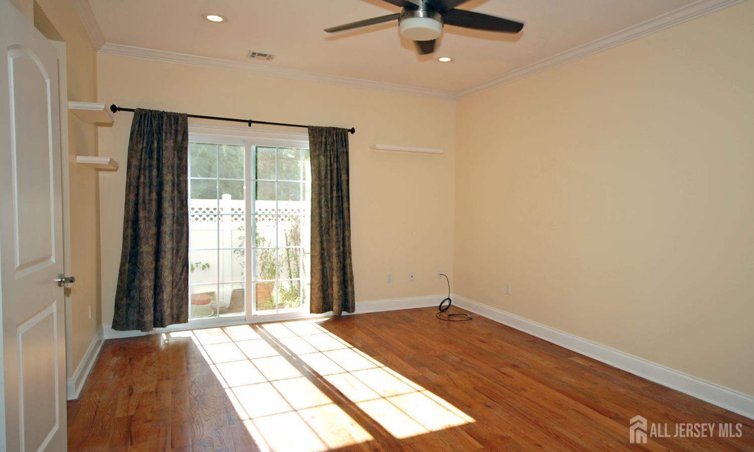 32 Cinder Road, Unit 3 Edison, NJ 08820 - Photo 27 of 34 a view of an empty room with a window
