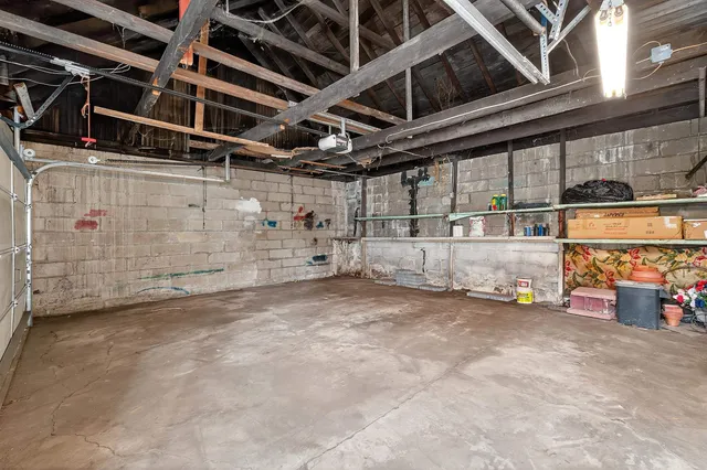 a view of a garage with storage