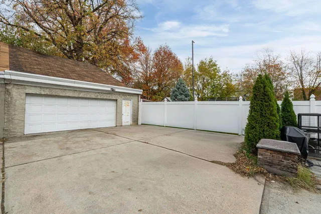 a view of backyard and tree