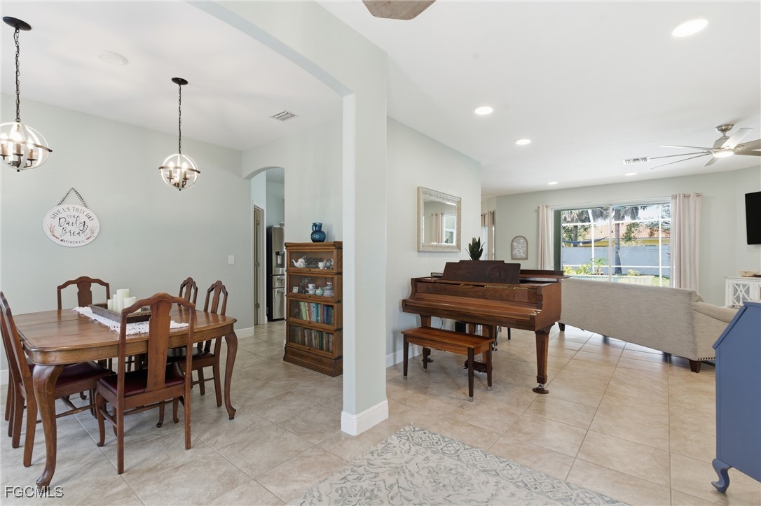2412 Nature Pointe Loop Fort Myers, FL 33905 - Photo 11 of 44 a living room with furniture and a window