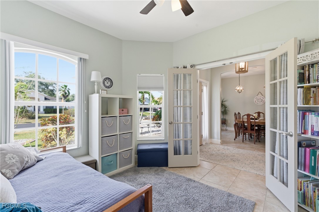 2412 Nature Pointe Loop Fort Myers, FL 33905 - Photo 22 of 44 a room with furniture and a window