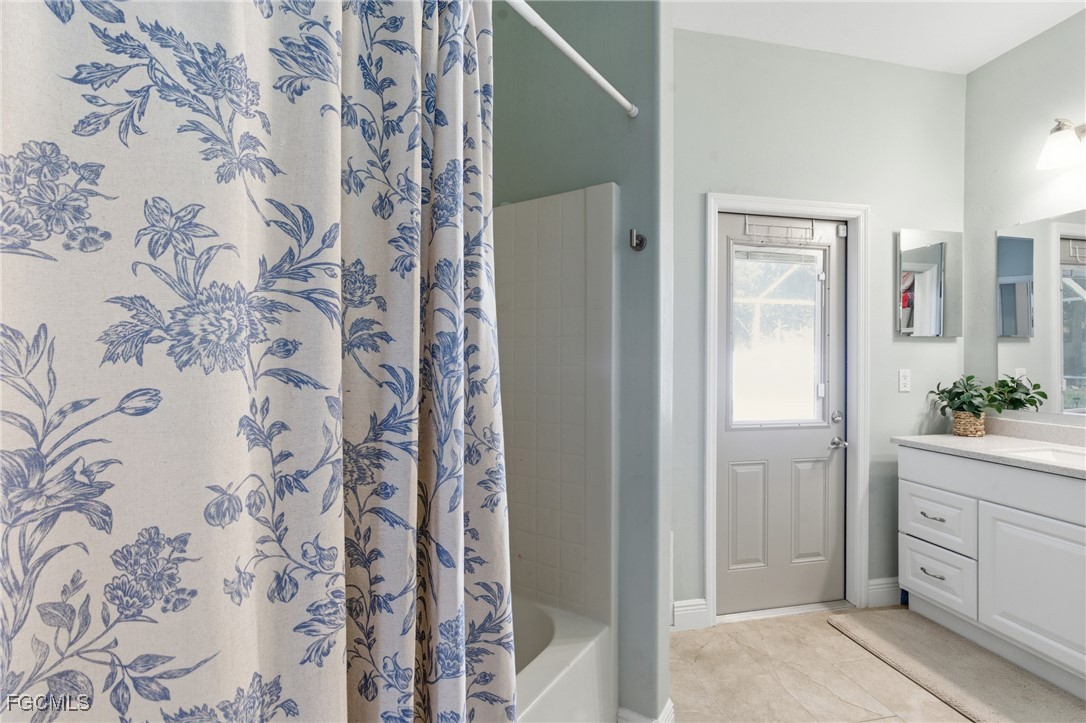 2412 Nature Pointe Loop Fort Myers, FL 33905 - Photo 33 of 44 a spacious bathroom with a shower and a sink
